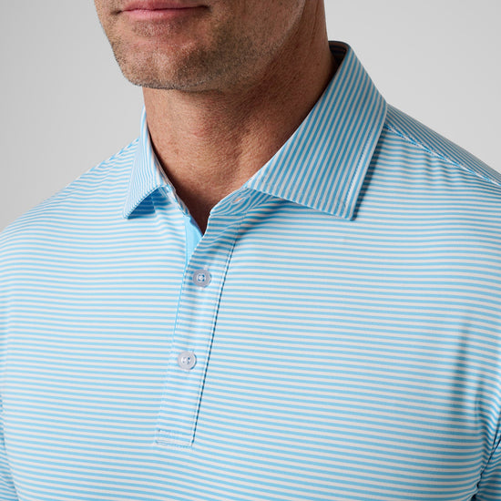 Blue and white striped polo shirt with button front and collared neckline.