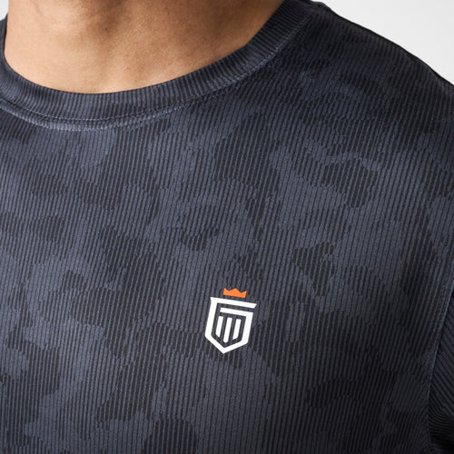 Black ribbed crew neck tee with small shield logo on chest.